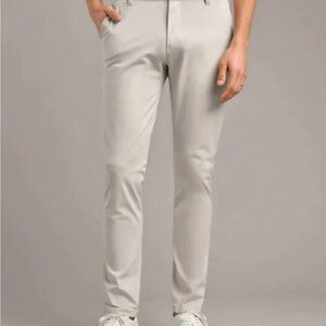 RHONE commuter slim stone performance pants. 34/31